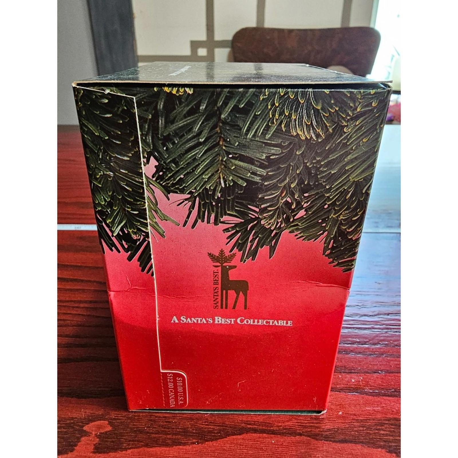 Santa's Best Christmas Charmers 1991 Ornament Kid Rocking a Santa Mask