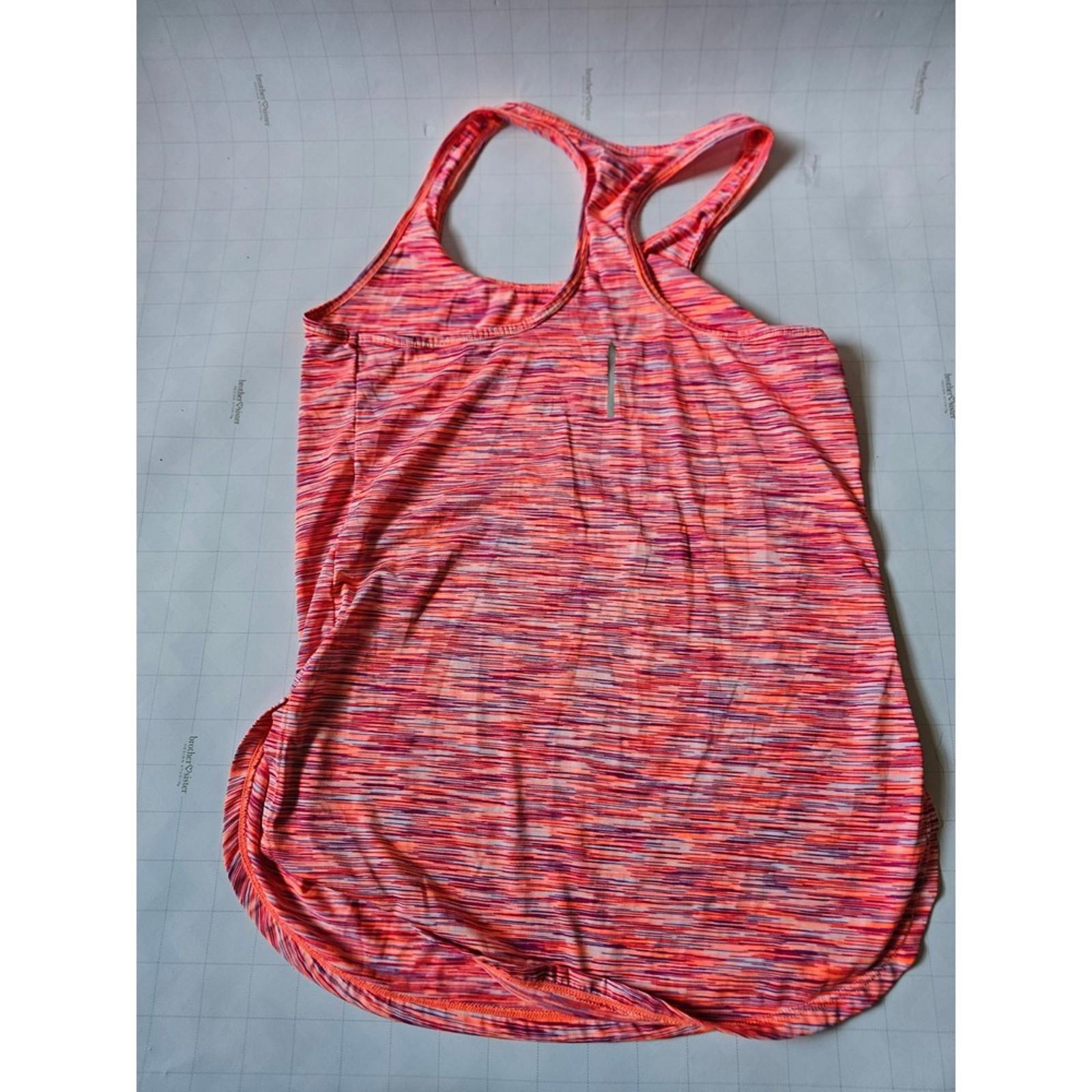 Reebok Women's Pink Activewear Tank Top - Ready to Sweat in Style!