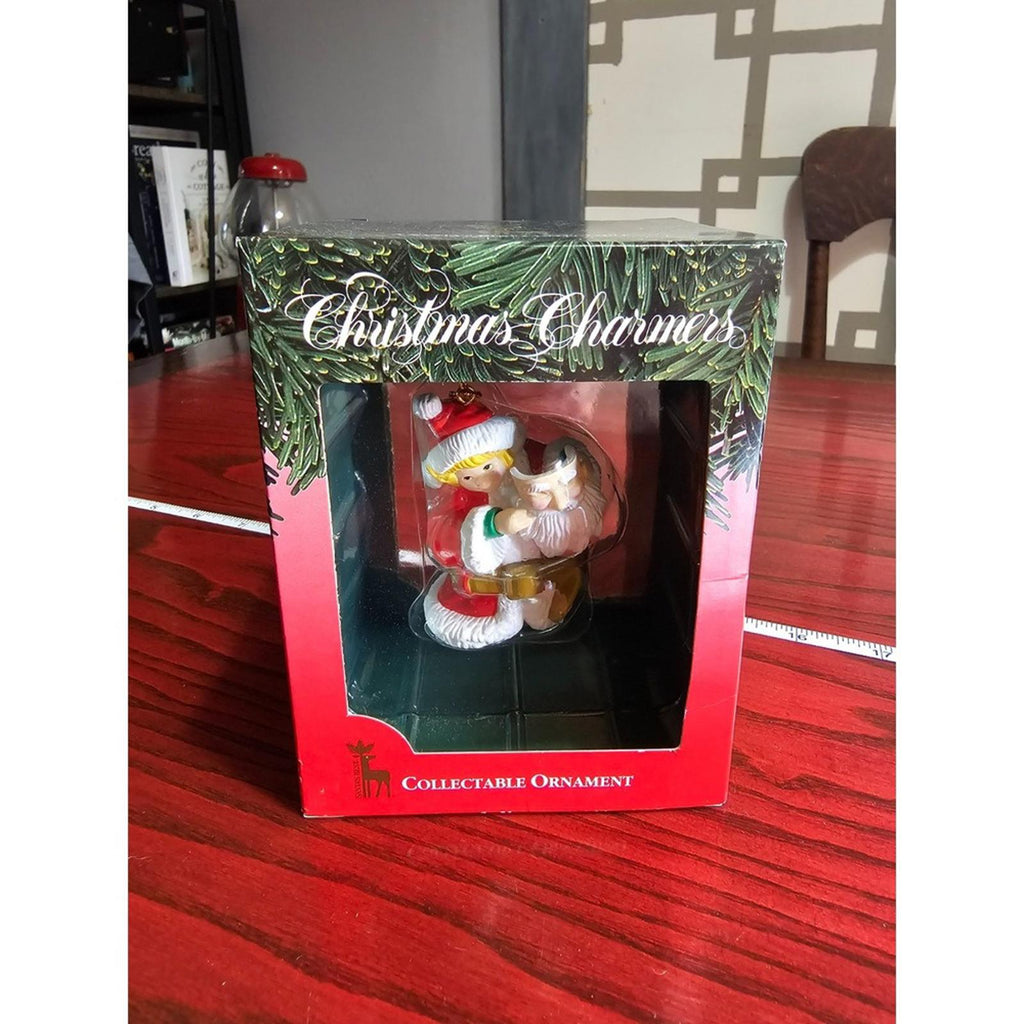 Santa's Best Christmas Charmers 1991 Ornament Kid Rocking a Santa Mask