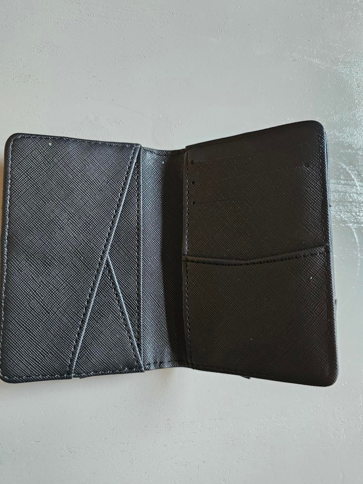 Sleek Black Leather Card Holder – Because Your Cards Deserve a Cozy Home