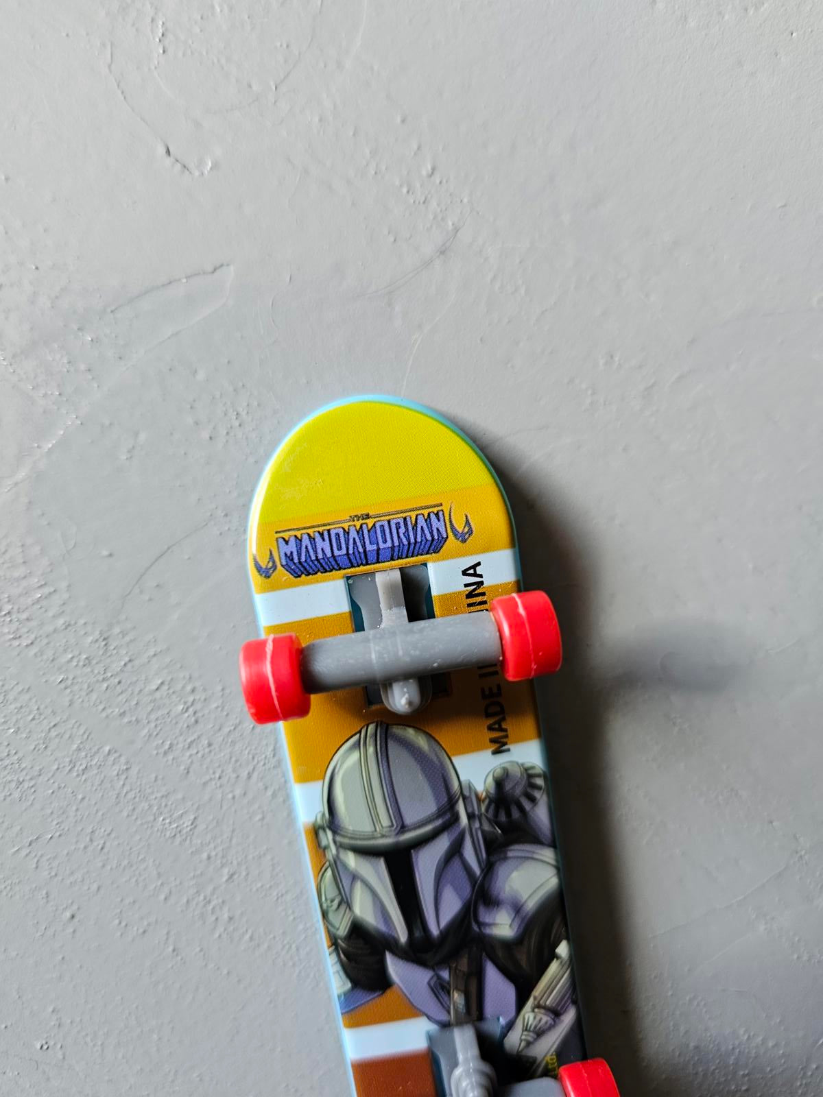 Star Wars The Mandalorian Mini Finger Skateboard Toy – Blue Deck with Red Wheels