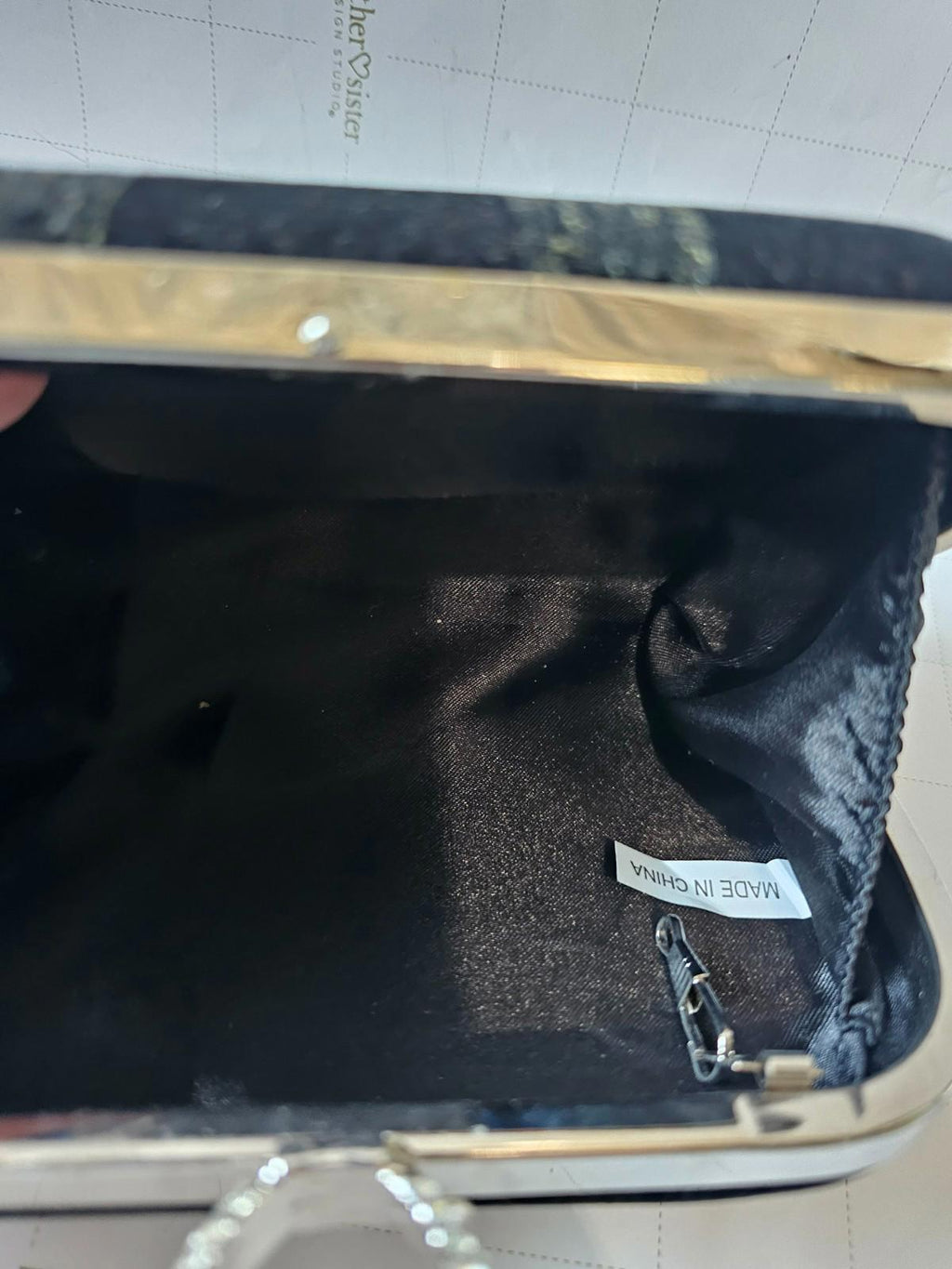 Sleek Black Velvet Clutch with Bling Ring