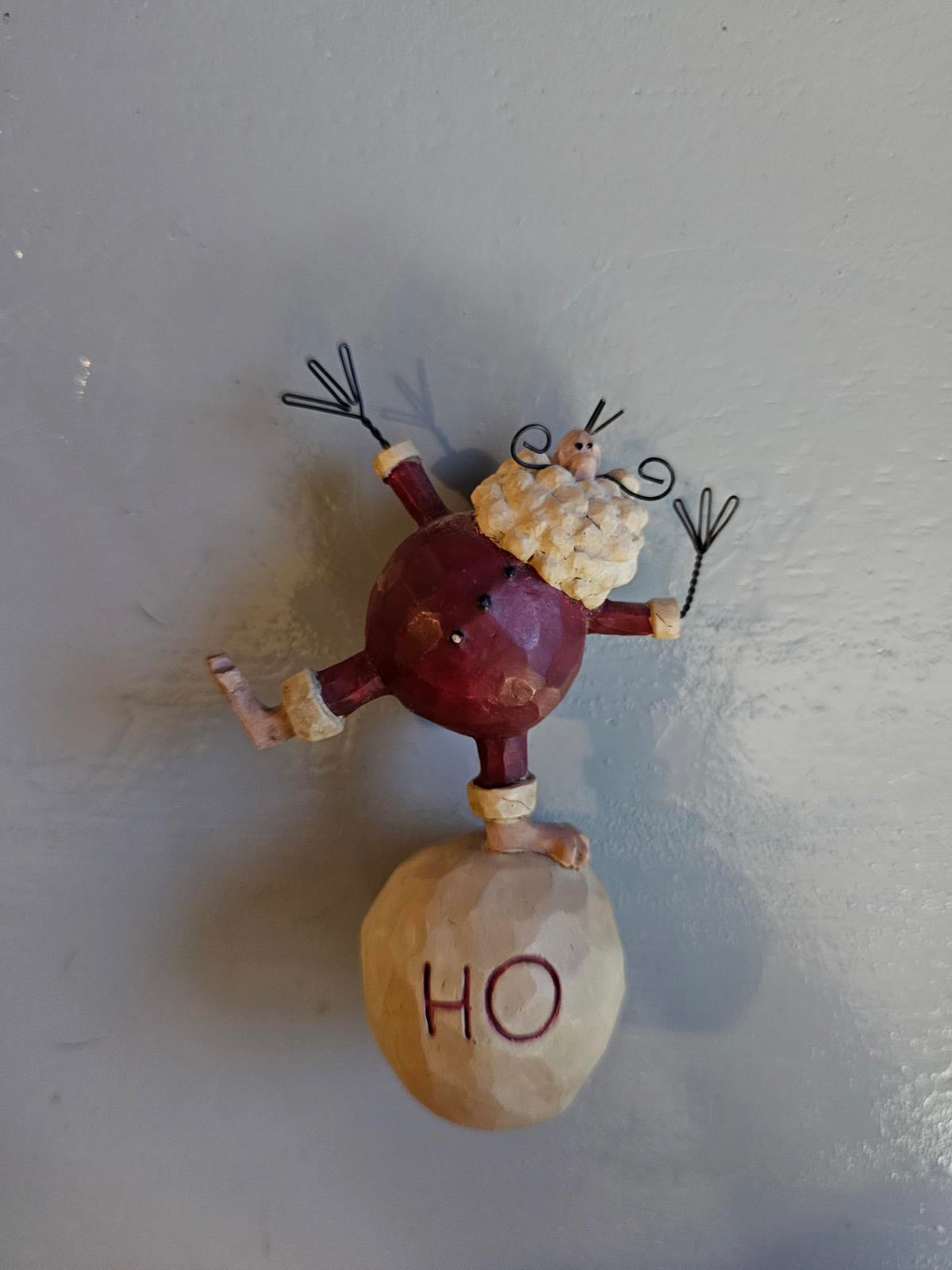 Santa's Balancing Act Holiday Ornament