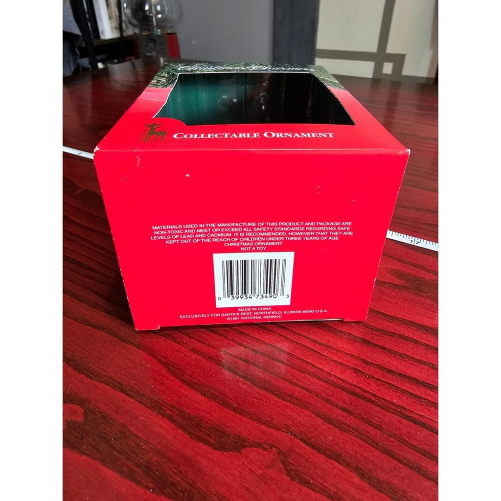 Santa's Best Christmas Charmers 1991 Ornament Kid Rocking a Santa Mask